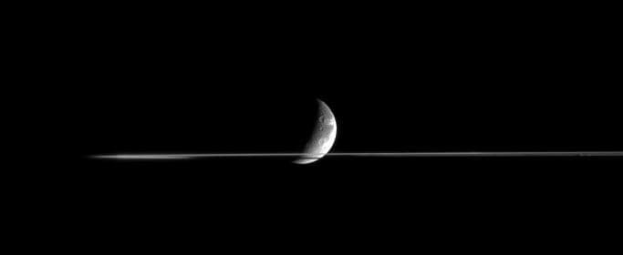 NASA image: Slicing Through Dione