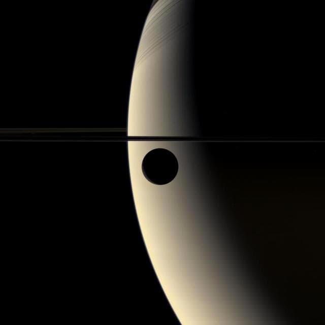 NASA image: Rhea Transits Saturn