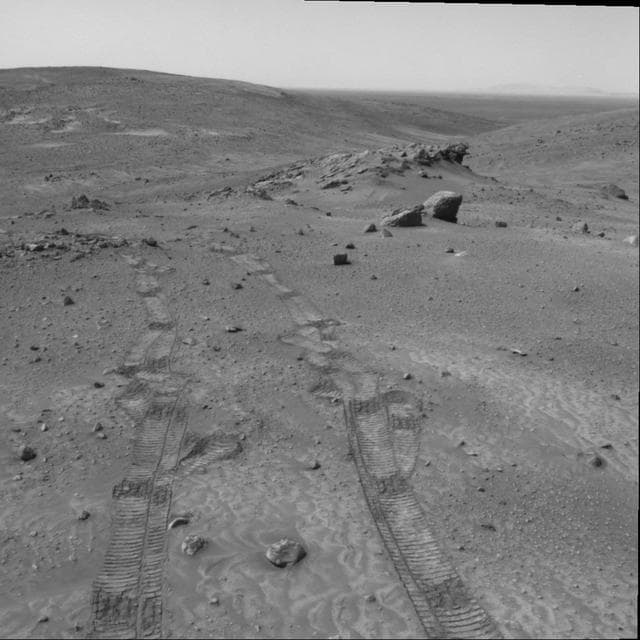 NASA image: Scientists Contemplate Tilting of Rock Layers on Mars