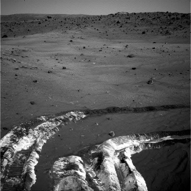 NASA image: Bright Soil Near McCool: Salty Deja Vu?