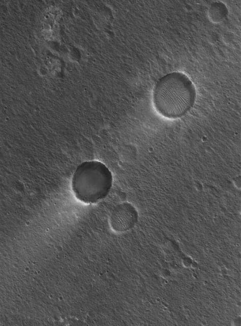 NASA image: Craters and Streaks