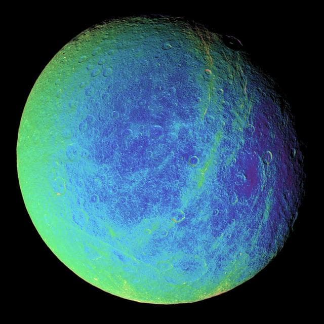 NASA image: Rhea Wisps in Color