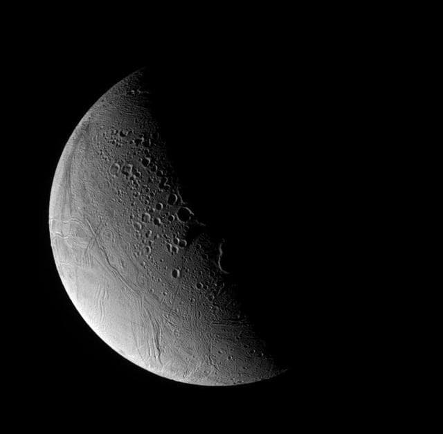 NASA image: Half-lit Enceladus