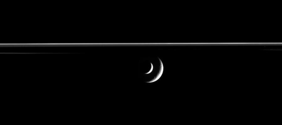 NASA image: Enceladus Transits Rhea