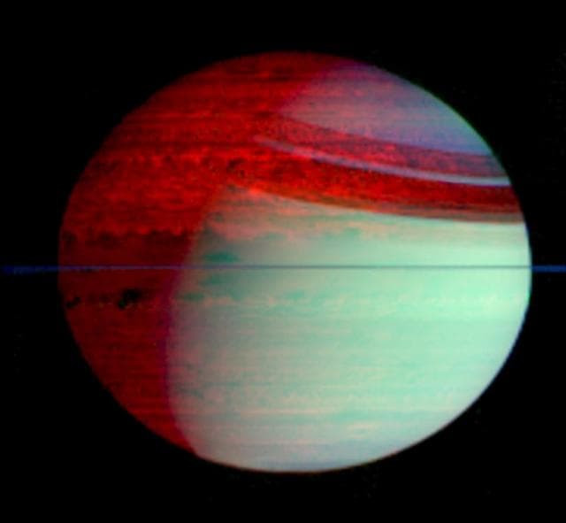 NASA image: Saturn Silhouetted Clouds