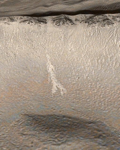 NASA image: New Gully Deposit in a Crater in the Centauri Montes Region