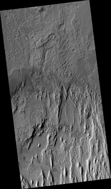 NASA image: Eroding Layers in an Impact Crater
