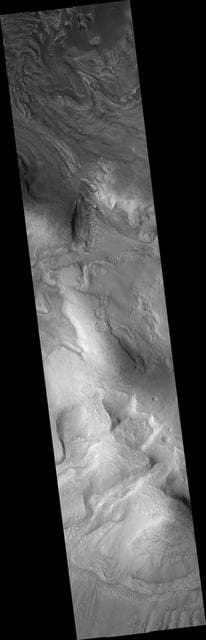 NASA image: Mantles and Flows in Moreux Crater