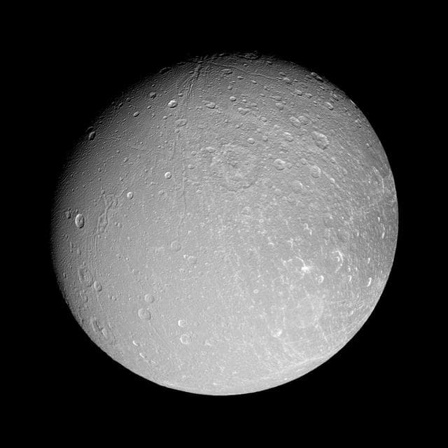 NASA image: Facing Dione