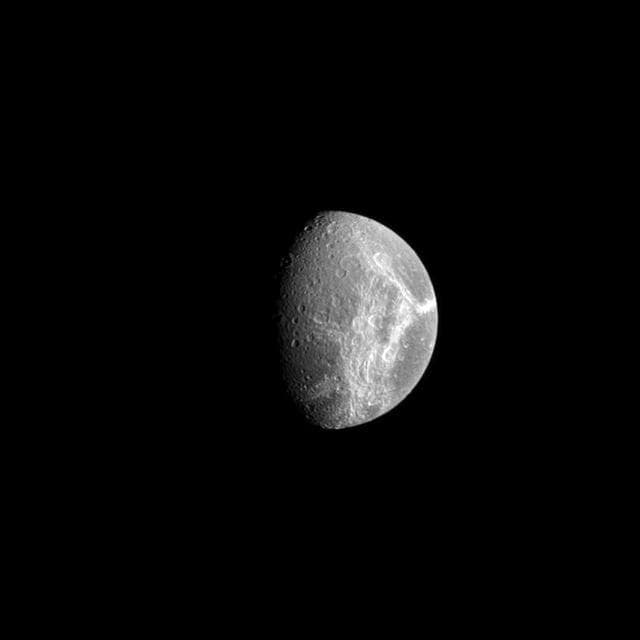 NASA image: Dione Icy Wisps