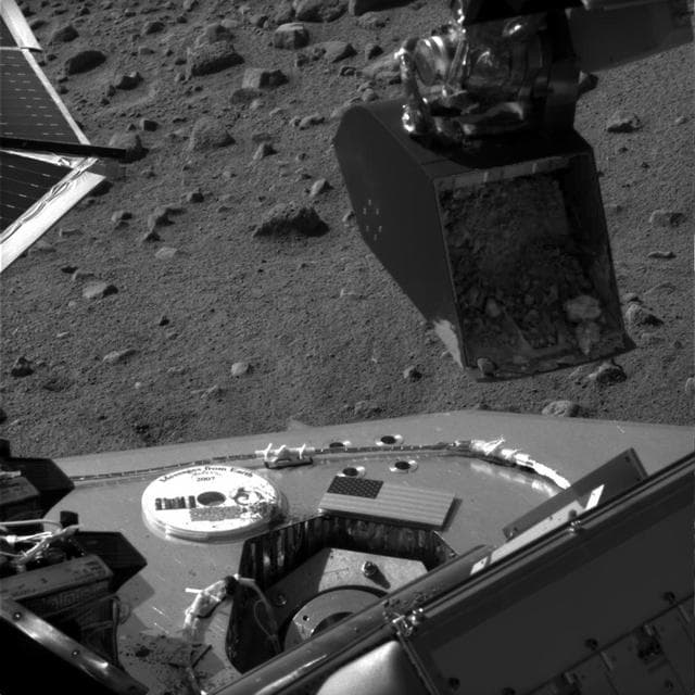 NASA image: Soil Sample Poised at TEGA Door