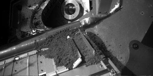 NASA image: Martian Soil Delivery to Analytical Instrument on Phoenix