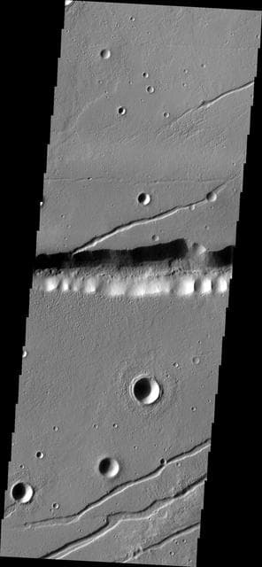 NASA image: Labeatis Fossae