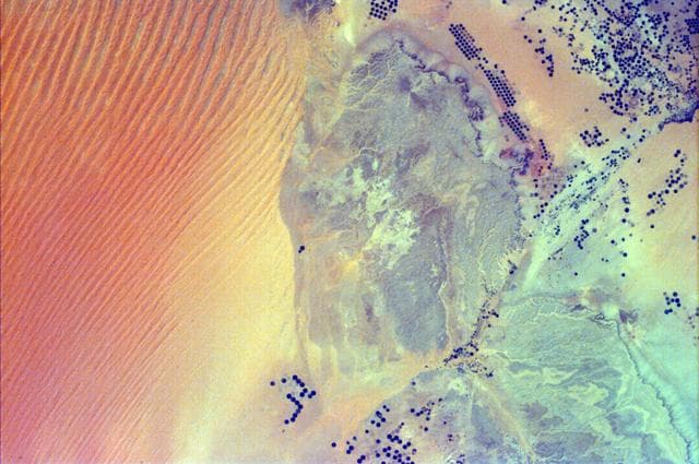 NASA image: Sand Dunes and Center-Pivot Irrigation in Saudi Arabia