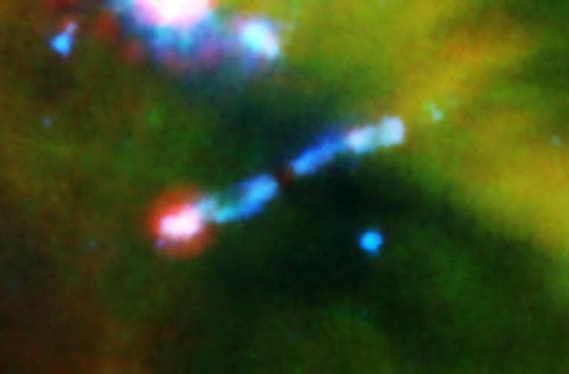 NASA image: Laser-Sharp Jet Splits Water