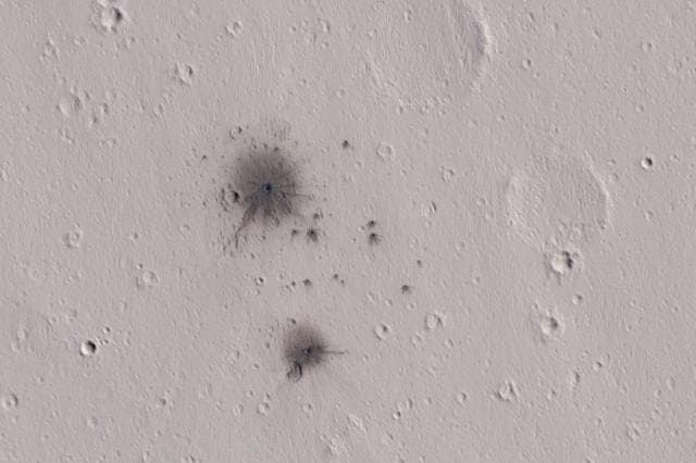 NASA image: A Recent Cluster of Impacts