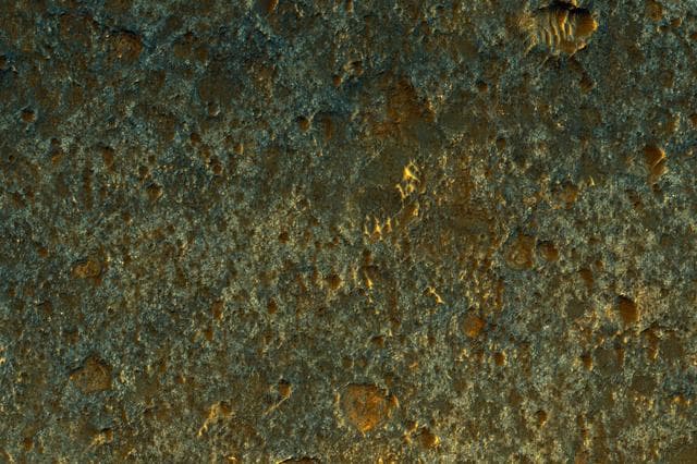 NASA image: Hard Knocks in Tyrrhena Terra