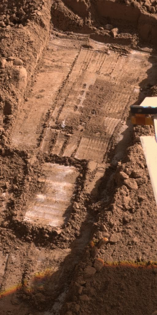 NASA image: Morning Frost in Trench Dug by Phoenix, Sol 113