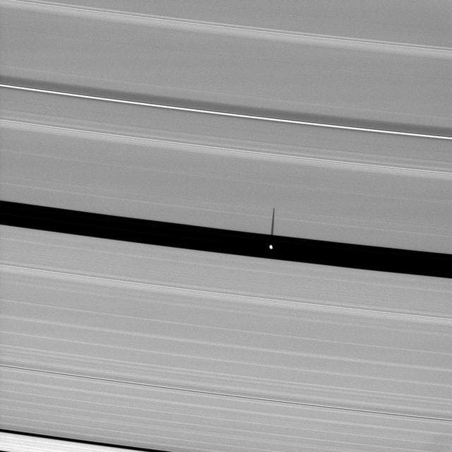 NASA image: Shadow of Saucer-Shaped Moon