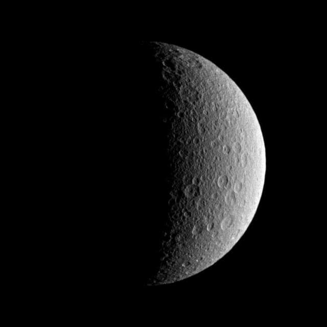 NASA image: Roughed-up Rhea