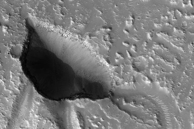 NASA image: Pits and Channels of Hebrus Valles