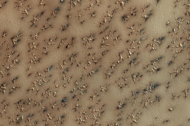 NASA image: How Gas Carves Channels