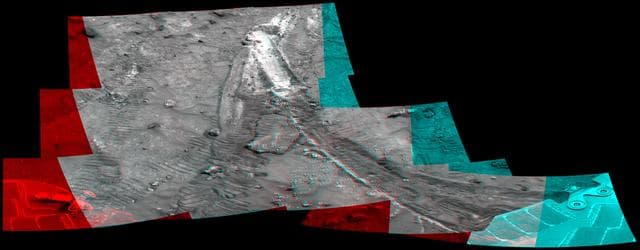 NASA image: Rover Wheel Churns Up Bright Martian Soil Stereo