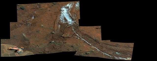 NASA image: Rover Wheel Churns Up Bright Martian Soil False Color