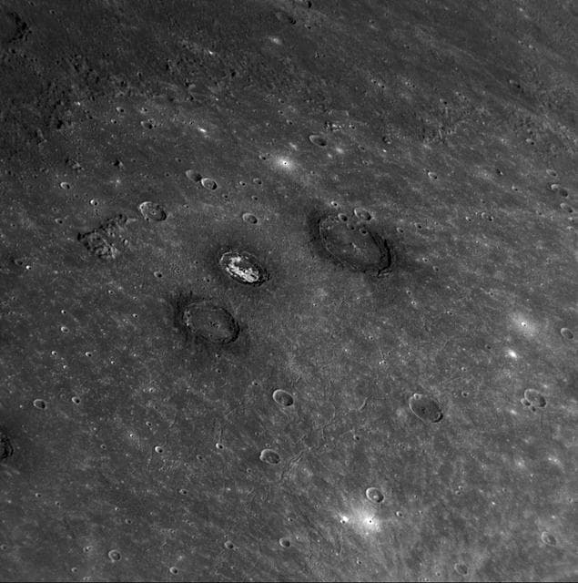 NASA image: A Trio of Craters: Munch, Sander, and Poe