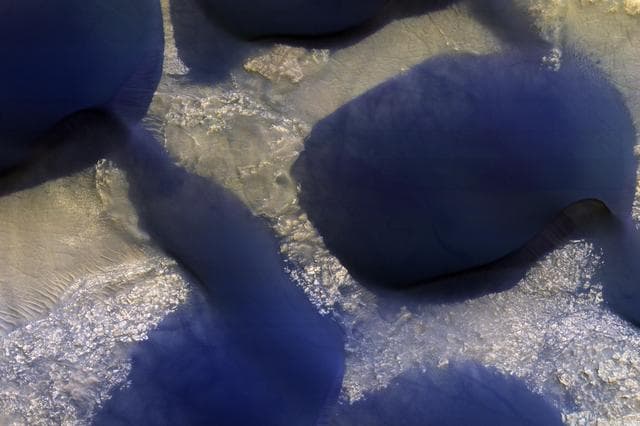 NASA image: The Changing Dunes of Wirtz Crater