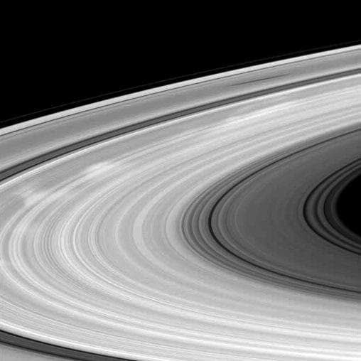 NASA image: Bright Spokes, Dark Shadow