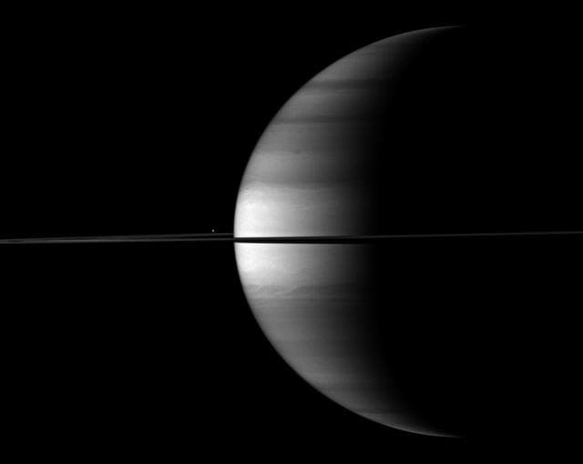 NASA image: Brilliant Blip Beyond Saturn