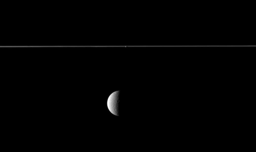 NASA image: Rhea and Edge-On Rings