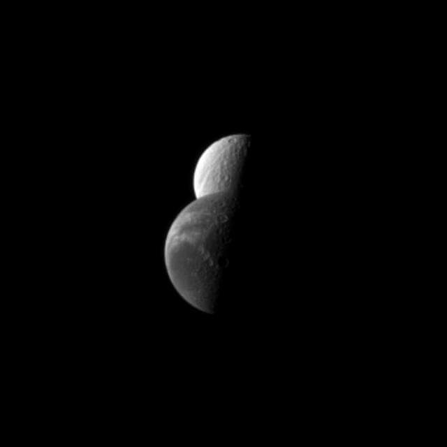 NASA image: Dione Sliding By Tethys
