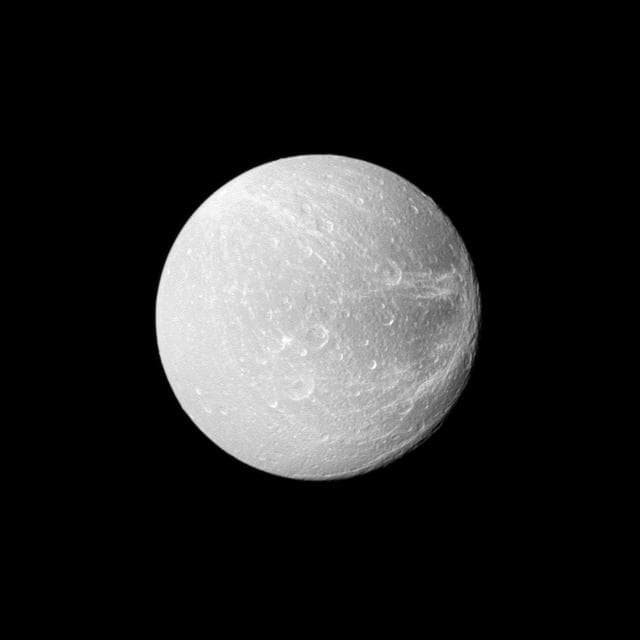 NASA image: Flying by Dione