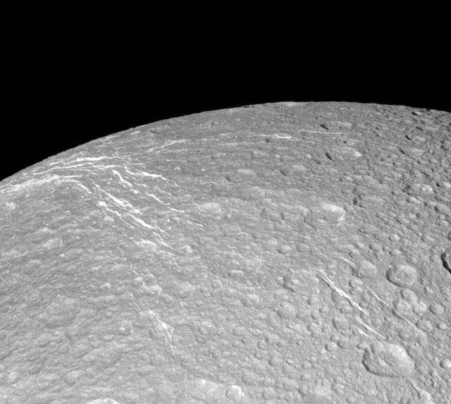 Looking Over Dione Wisps
