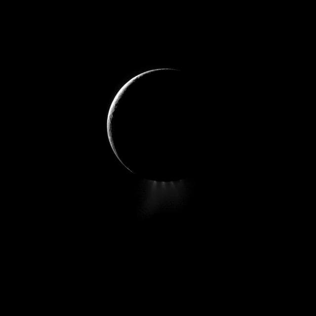 NASA image: Plumes and a Crescent