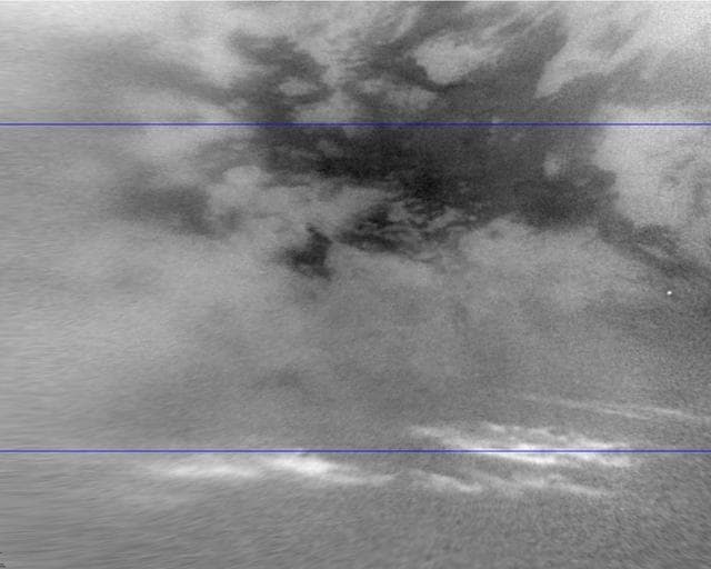 NASA image: Titan Moving Mid-Latitude Clouds
