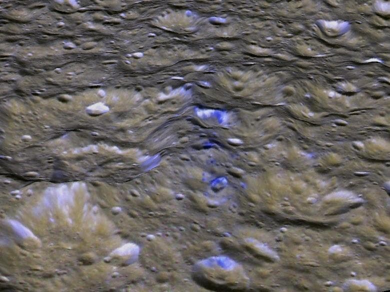 NASA image: Rhea Blue Streaks Looking West