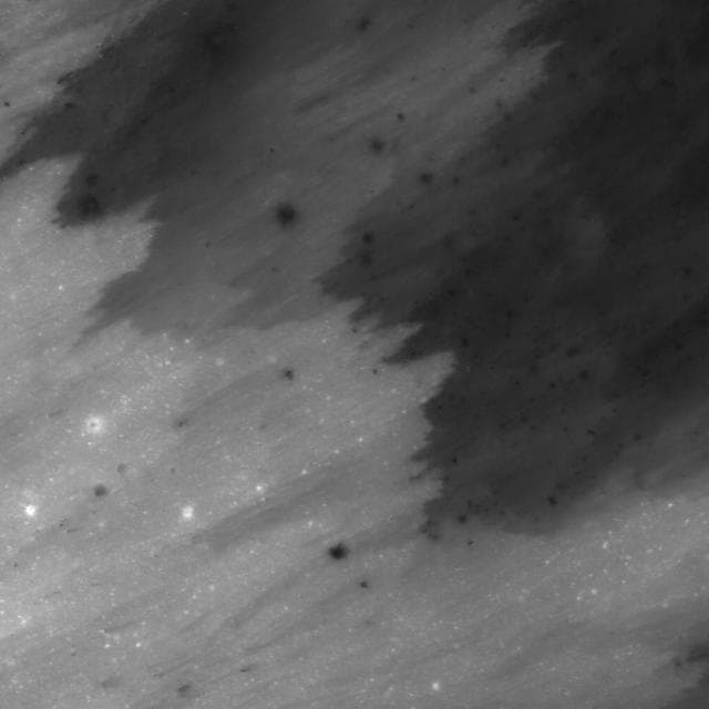 NASA image: Ejecta Sweeps the Surface