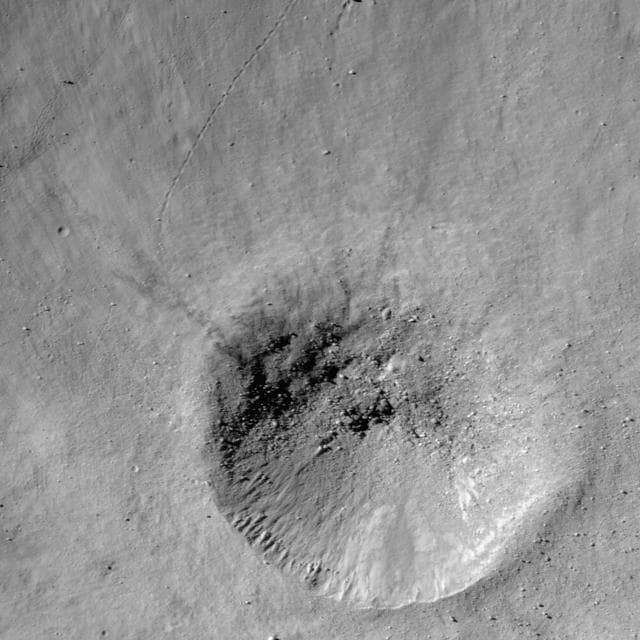 NASA image: Small Crater on the wall of Metius B