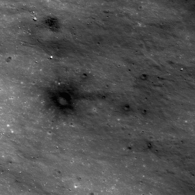 NASA image: Dark Craters on a Bright Ejecta Blanket