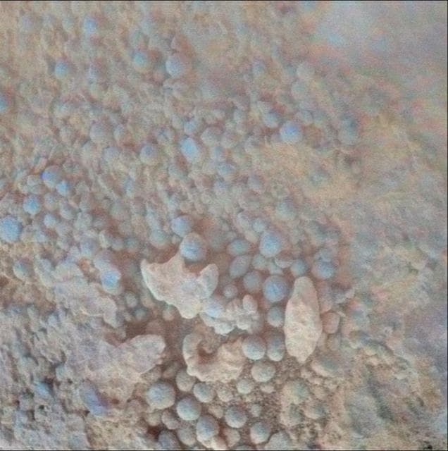 NASA image: Coating on Rock Beside a Young Martian Crater