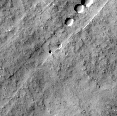 NASA image: Martian Pit Feature Found by Seventh Graders