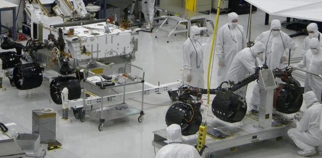 NASA image: Installation of Curiosity Wheels and Suspension