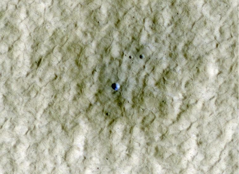 NASA image: Exposed Ice in a Fresh Crater