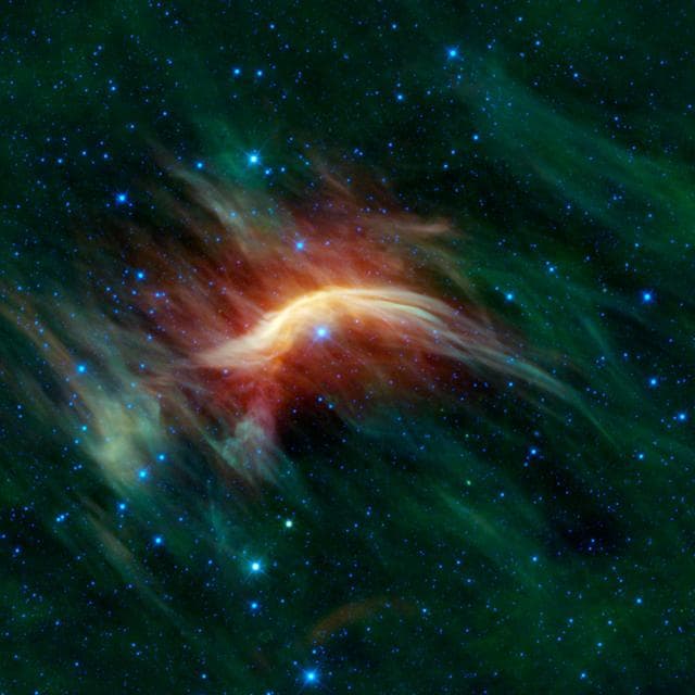 NASA image: Zeta Ophiuchi -- Runaway Star Plowing through Space Dust