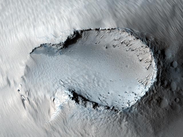NASA image: Possible Cinder Cone on the Southern Flank of Pavonis Mons