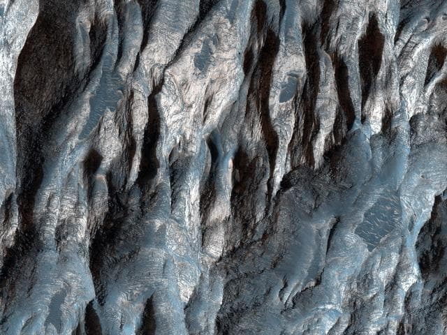 NASA image: Strengths of Materials in Ganges Mensa