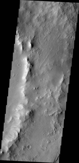 NASA image: Dark Slope Streaks within Tikhonravov Crater
